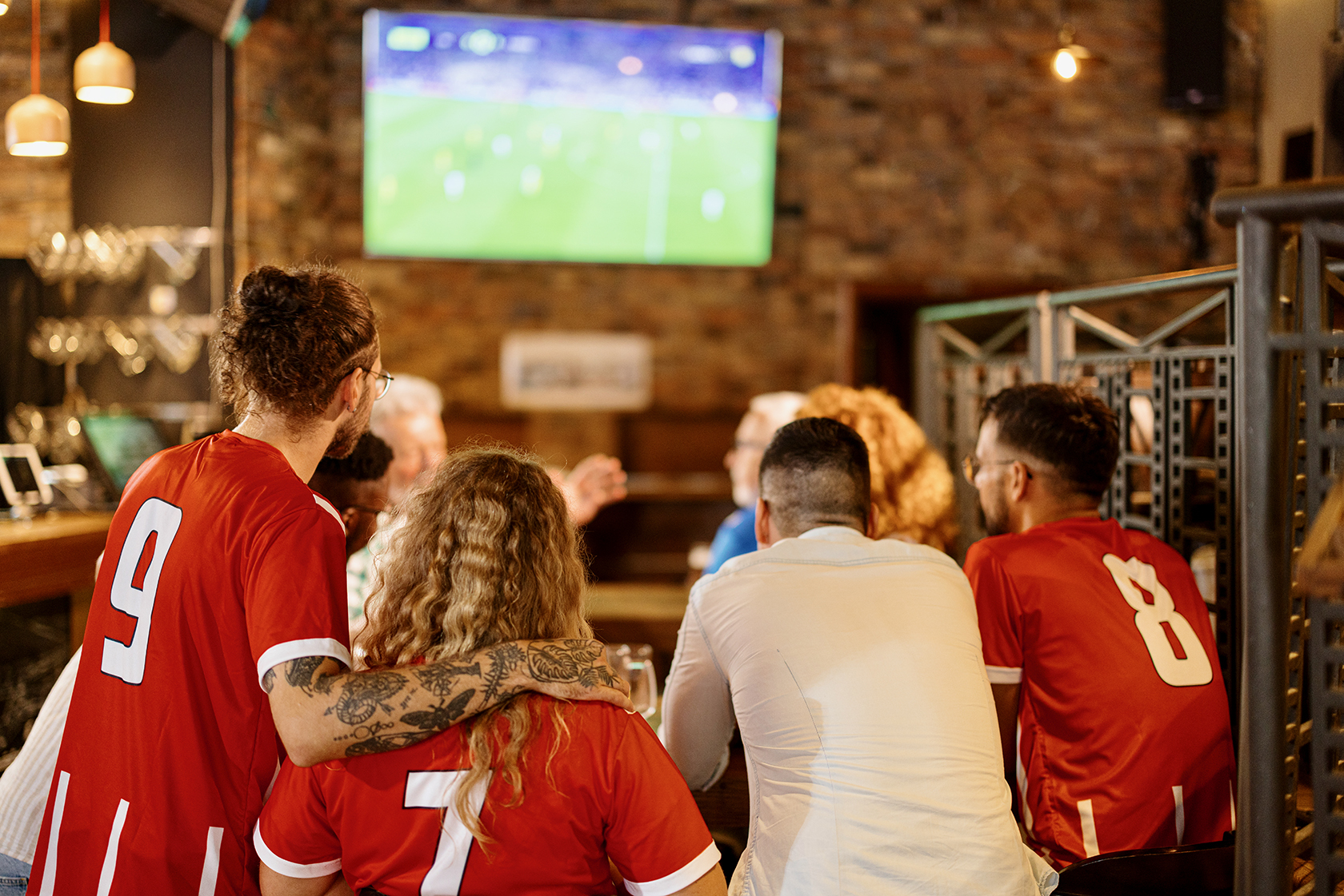 Gambling watching sports in sports bar