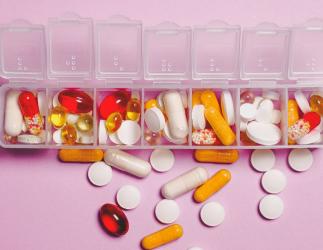 container filled with a series of prescription drugs