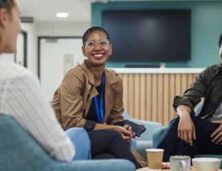 People sitting together talking. 