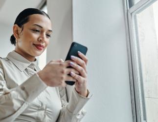 Woman staring at her phone.