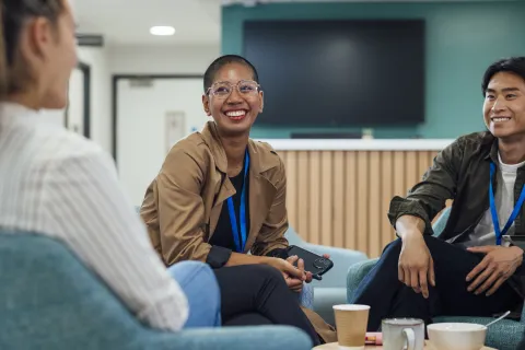People sitting together talking. 