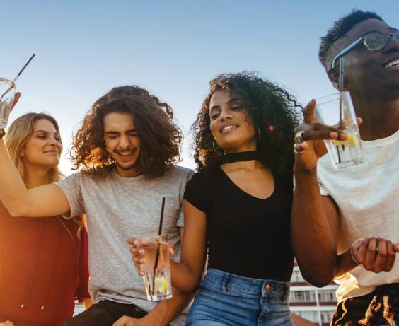Young people in outdoor party setting